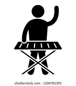 Man standing with musical keyboard for playing music 