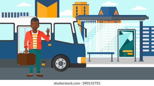 Man standing near bus.