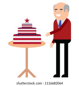 The man is standing near the cake with the symbols of USA isolated on white background