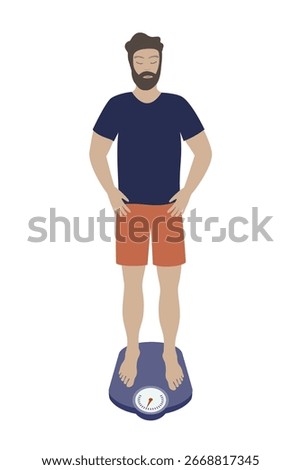 Man standing on bathroom scale, measuring his body weight.