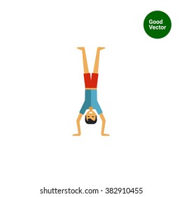 Man standing on head
