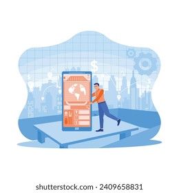 Hombre de pie sobre la mesa con el smartphone. Smartphones con telecomunicaciones creativas modernas y redes de internet conectadas en ciudades inteligentes. Telecomunicaciones e Internet en el concepto de ciudad inteligente.