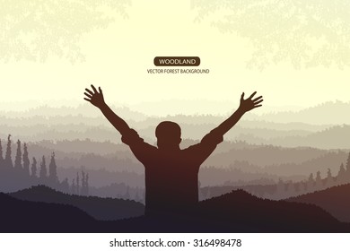 man standing on the top of mountain