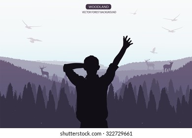 man standing on the top of mountain