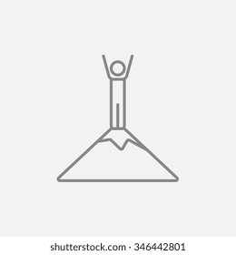 Man standing on the top of mountain line icon for web, mobile and infographics. Vector dark grey icon isolated on light grey background.