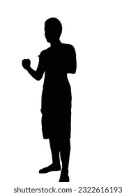 The man is standing and taking a fighting stance.