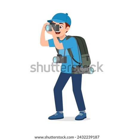 man standing taking photo with camera