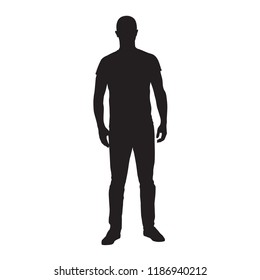 Man standing in t-shirt and jeans, isolated vector silhouette. Front view