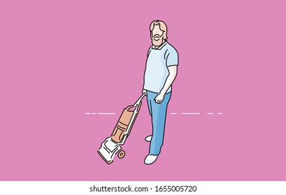 man standing with upright vacuum cleaner