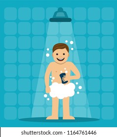 a man stands all in foam and under the shower