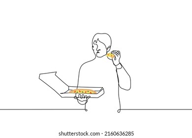 man stands with a box of pizza and eats a piece - one line drawing vector. concept eating pizza alone, pizza for one