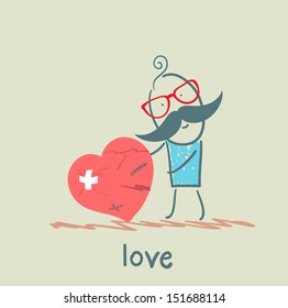 a man stands with a broken heart