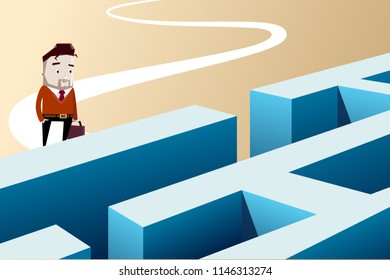 Man stands in front of a maze