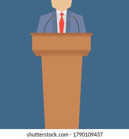 
a man stands in front of a podium and talks or debates
