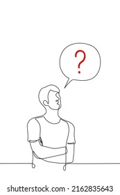 man stands with his arms crossed next to him a cloud with a question mark - one line drawing vector. concept of a question, an unsolvable problem, search for an answer