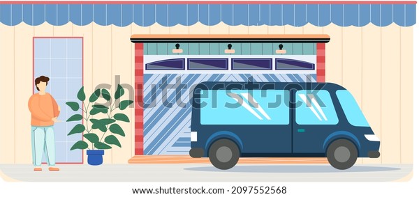 Man stands near garage with automatic gates.\
Vehicle storage space, room for cars. Gates with lifting mechanism,\
place for automobile parking. Car near garage in modern residential\
building