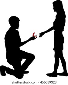 Man stands on one knee and offers the woman to marry him, Will You Marry Me?
