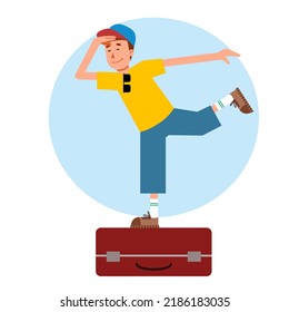 A man stands on a suitcase and looks into the distance. The man is waiting for his departure.