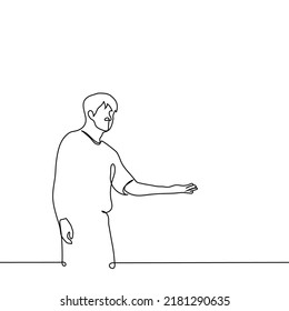 man stands and shows with his hand to his left - one line drawing vector. concept advertiser, host or guide invite showing direction