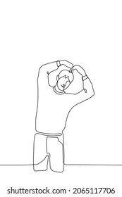 man stands smiling with his hands folded in the shape of a heart above his head - one line drawing. the Korean gesture is "saranghae" which means "I love you".  concept of love, friendliness, empathy