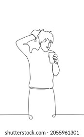 man stands with a towel on his head and a glass in his hands - one line drawing. concept of hurry to get to work or school, coffee after shower 