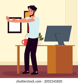 man stretching and taking break in office