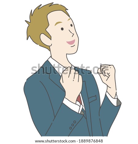 A man in a suit doing a guts pose with a smile