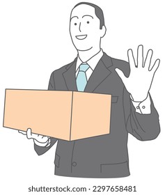 A man in a suit holding a cardboard box and waving
