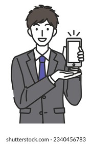 Ein Mann in einem Anzug, der ein Smartphone vorstellt