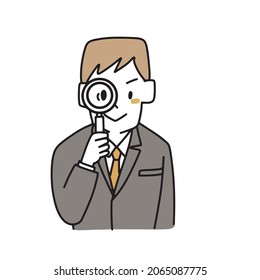 A man in a suit looking through a magnifying glass