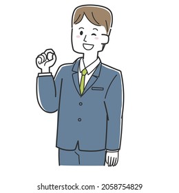 A man in a suit making a circle by hand