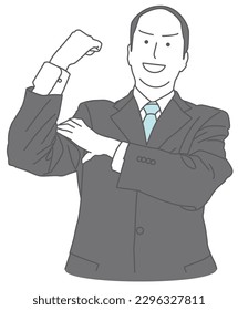 A man in a suit posing with a clenched fist