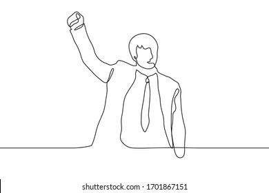 The man in the suit raised his right hand fist up. Businessman in a victory gesture - fist lifted up above the head. One continuous line drawing, can be used for animation