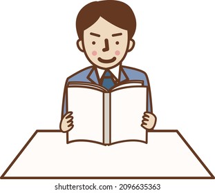 Un hombre con traje leyendo un libro.