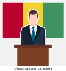 Man in suit standing at rostrum Front of Guinea Country Flag. business man Presentation conference concept. Modern flat design vector illustration. Country Flag background 
