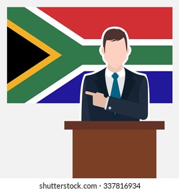 Man in suit standing at rostrum Front of South Africa Country Flag Pointing to the flag. Business man Presentation conference concept. Modern flat design vector background illustration.