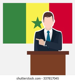 Man in suit standing at rostrum Front of Senegal Country Flag Pointing to the flag. Business man Presentation conference concept. Modern flat design vector background illustration.