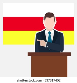 Man in suit standing at rostrum Front of South Ossetia Country Flag Pointing to the flag. Business man Presentation conference concept. Modern flat design vector background illustration.