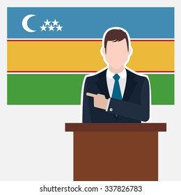 Man in suit standing at rostrum Front of Karakalpakstan Country Flag Pointing to the flag. business man Presentation conference concept. Modern flat design vector background illustration.