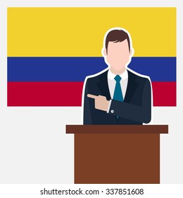 Man in suit standing at rostrum Front of Colombia Country Flag Pointing to the flag. business man Presentation conference concept. Modern flat design vector background illustration.