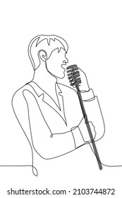 man in suit stands and sings into vintage microphone - one line drawing vector. logo, poster for karaoke bar, live music concert, music festival, song vocal competition 