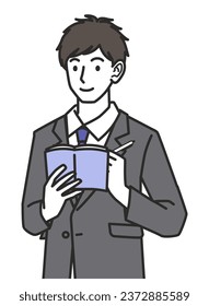 A man in a suit taking notes