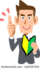 A man in a suit wearing a beginner's mark in hand