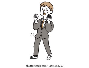 A man in a suit who is backtracking