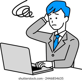 A man in a suit working on a laptop looking troubled
