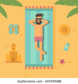 Man sunbathing at the beach