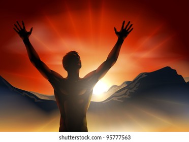 A man at sunrise or sunset with hands raised and sun rising over mountains.