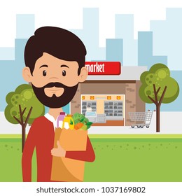 man with supermarket groceries in shopping bag