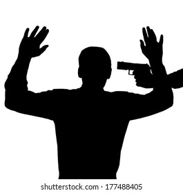 Man surrendering with gun against his head