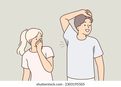 Man with sweaty armpit emitting unpleasant odor near woman who is disgusted and pinches nose because of stench. Guy not using deodorant or antiperspirant with sweaty armpits and stains on t-shirt